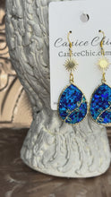 Load and play video in Gallery viewer, Sapphire Sunburst Earrings 3" BLS1
